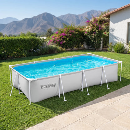 Piscina Bestway Steel Pro Deluxe 3,66 x 2,01 m armada en un patio con la cordillera de fondo